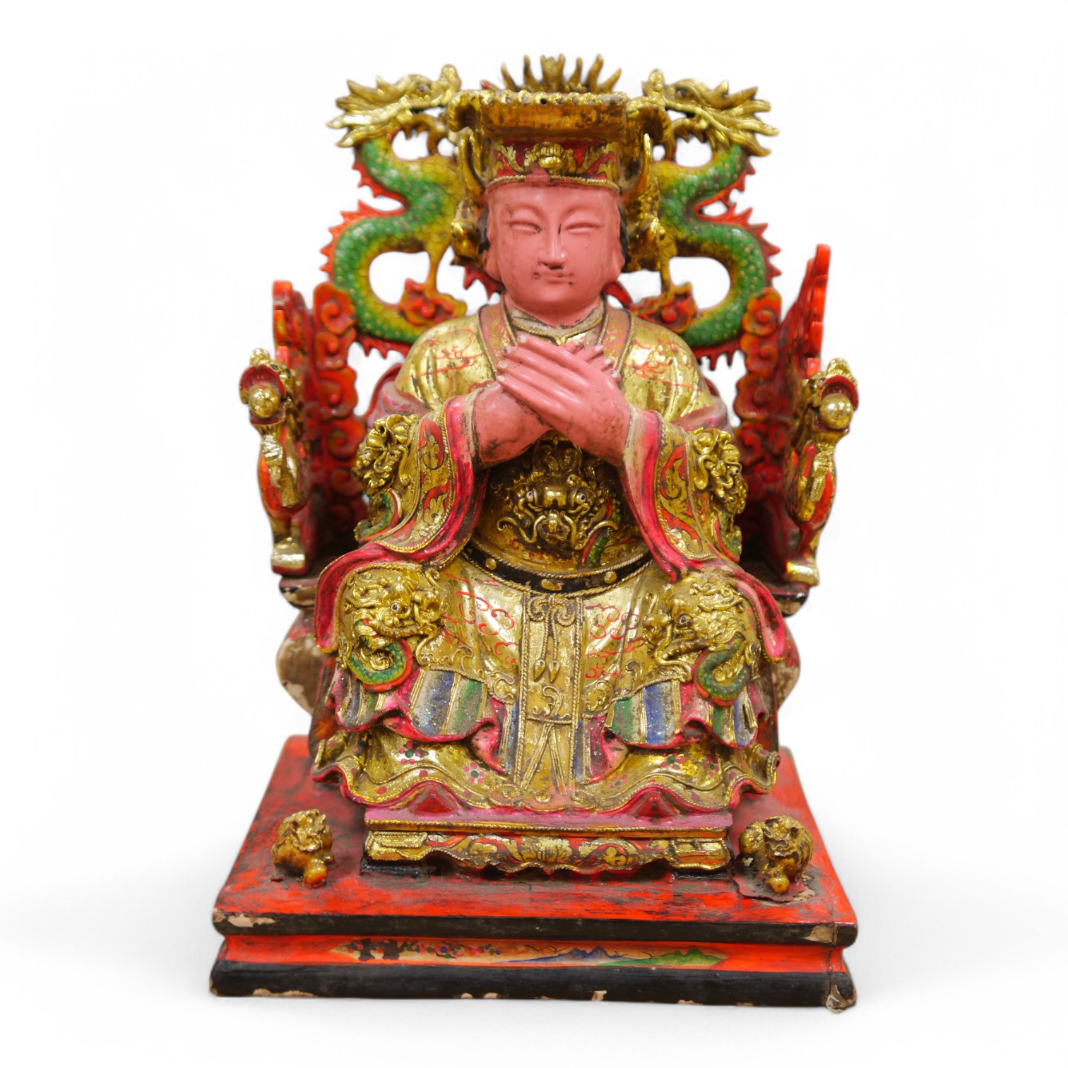 A Chinese gilt and painted composition figure of a seated immortal, 31cm tall. Condition - poor to fair